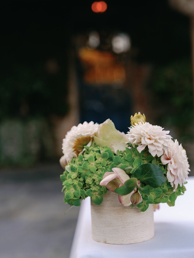 Dahlias and hydrangea in a stone vessel