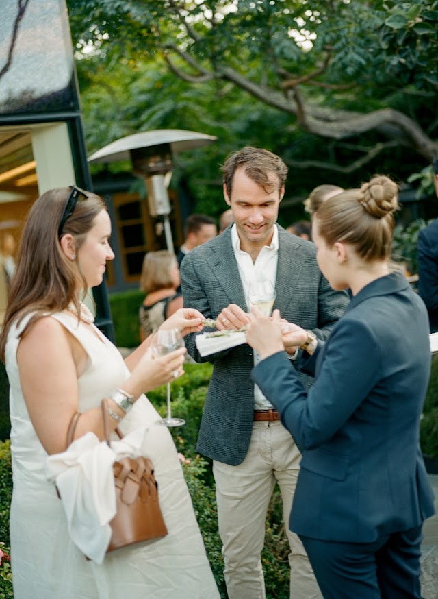 Champagne poured for arriving guests
