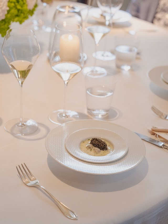 A place setting under candlelight